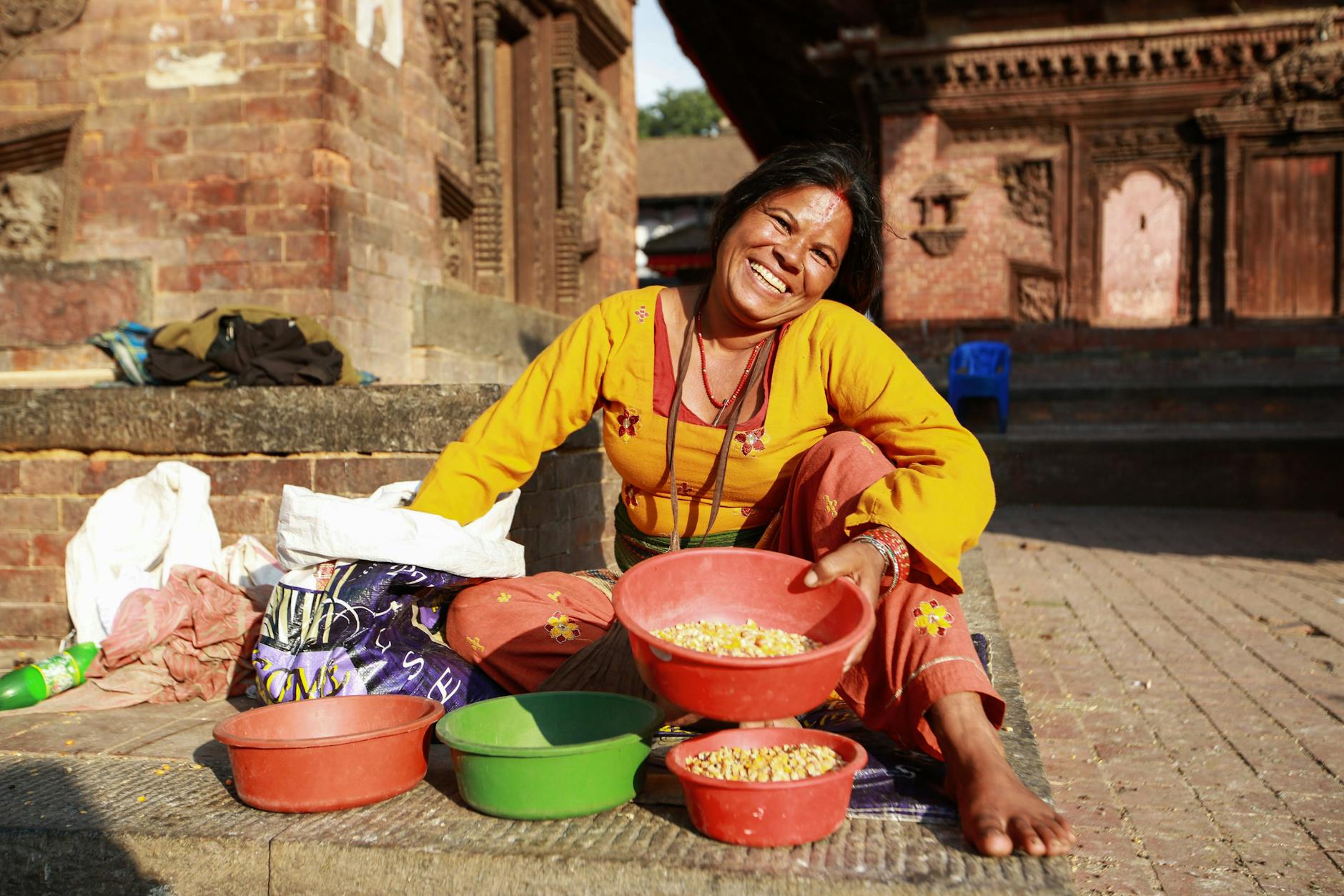 african american woman selling food on the market