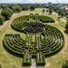 Aerial view of Hampton Court Garden hedge maze with visitors walking through paths
